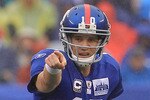 EAST RUTHERFORD, NJ - SEPTEMBER 12:  Eli Manning #10 of the New York Giants gives instructions against the Carolina Panthers during the NFL season opener at New Meadowlands Stadium on September 12, 2010 in East Rutherford, New Jersey.  (Photo by Chris McGrath/Getty Images)