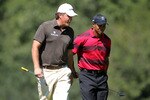 LEMONT, IL - SEPTEMBER 12:  (L-R) Phil Mickelson and Tiger Woods walk down the fifth fairway during the final round of the BMW Championship at Cog Hill Golf & Country Club on September 12, 2010 in Lemont, Illinois.  (Photo by Jamie Squire/Getty Images)