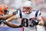 FOXBORO, MA - SEPTEMBER 12:  Wes Welker #83 of the New England Patriots carries the ball as Leon Hall #29 of the Cincinnati Bengals defends during the NFL season opener on September 12, 2010 at Gillette Stadium in Foxboro, Massachusetts. The Patriots defeated the Bengals 38-24.  (Photo by Elsa/Getty Images)