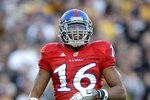 KANSAS CITY, MO - NOVEMBER 28: Cornerback Chris Harris #16 of the Kansas Jayhawks looks on during the game against the Missouri Tigers at Arrowhead Stadium on November 28, 2009 in Kansas City, Missouri. (Photo by Jamie Squire/Getty Images)