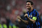 MADRID, SPAIN - MAY 22:  Javier Zanetti  of Inter Milan celebrates victory after the UEFA Champions League Final match between FC Bayern Muenchen and Inter Milan at the Estadio Santiago Bernabeu on May 22, 2010 in Madrid, Spain.  (Photo by Shaun Botterill/Getty Images)
