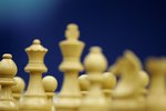 DOHA, QATAR - DECEMBER 02:  A detail of the chess pieces on the board before the start of the Men's and Women's Rapid Chess Individual during the 15th Asian Games Doha 2006 at the Khalifa Tennis & Squash Complex on December 2, 2006 in Doha, Qatar.  (Photo by Streeter Lecka/Getty Images for DAGOC)