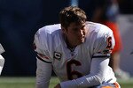 CHICAGO - SEPTEMBER 12: Jay Cutler #6 of the Chicago Bears rests during a time-out against the Detroit Lions during the NFL season opening game at Soldier Field on September 12, 2010 in Chicago, Illinois. The Bears defeated the Lions 19-14. (Photo by Jonathan Daniel/Getty Images)