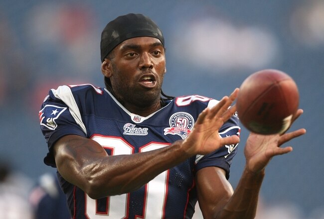 FOXBORO, MA - AUGUST 20:  Randy Moss #81 of the New England Patriots catches a pass during warm ups against the Cincinnati Bengals during their preseason game at Gillette Stadium on August 20, 2009 in Foxboro, Massachusetts.  (Photo by Jim Rogash/Getty Images)
