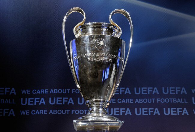 NYON, SWITZERLAND - AUGUST 06:  The UEFA Champions League trophy is displayed prior to the UEFA Champions League play-off draw on August 6, 2010 in Nyon, Switzerland. The play-offs are played over two legs on 17/18 and 24/25 August. The ten play-off winners will join the 22 automatic entrants in the UEFA Champions League group stage, the draw for which will be held in Monaco on 26 August 26, 2010. (Photo by Fabrice Coffrini/EuroFootball/Getty Images)
