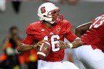 RALEIGH, NC - SEPTEMBER 3:  Quarterback Russell Wilson #16 of the North Carolina State Wolfpack drops back to pass against the South Carolina Gamecocks during the game at Carter-Finley Stadium on September 3, 2009 in Raleigh, North Carolina. (Photo by Streeter Lecka/Getty Images)