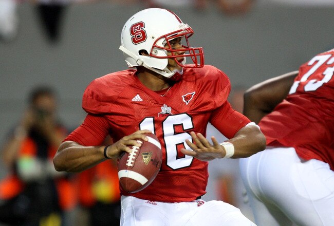 RALEIGH, NC - SEPTEMBER 3:  Quarterback Russell Wilson #16 of the North Carolina State Wolfpack drops back to pass against the South Carolina Gamecocks during the game at Carter-Finley Stadium on September 3, 2009 in Raleigh, North Carolina. (Photo by Streeter Lecka/Getty Images)