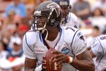 Atlanta Falcons quarterback Michael Vick sets to pass February 12, 2006 at the Pro Bowl at Aloha Stadium in Honolulu, Hawaii.  (Photo by Al Messerschmidt/Getty Images)