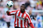 WIGAN, ENGLAND - SEPTEMBER 11: Asamoah Gyan of Sunderland in action during the Barclays Premier League match between Wigan Athletic and Sunderland at DW Stadium on September 11, 2010 in Wigan, England. (Photo by Chris Brunskill/Getty Images)
