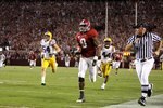 TUSCALOOSA, AL - NOVEMBER 07:  Julio Jones #8 of the Alabama Crimson Tide rushes upfield for a 73 yard touchdown against the Louisiana State University Tigers at Bryant-Denny Stadium on November 7, 2009 in Tuscaloosa, Alabama.  (Photo by Kevin C. Cox/Getty Images)