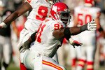 OAKLAND, CA - NOVEMBER 15:  Tamba Hali #91 of the Kansas City Chiefs celebrates after a play during their game against the Oakland Raiders at Oakland-Alameda County Coliseum on November 15, 2009 in Oakland, California.  (Photo by Ezra Shaw/Getty Images)