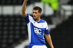DERBY, ENGLAND - JULY 31:  Scott Dann of Birmingham City in action during the Pre-Season Friendly match between Derby County and Birmingham City at the County Ground on July 31, 2010 in Derby, England.  (Photo by Matthew Lewis/Getty Images)