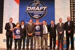 LOS ANGELES, CA - JUNE 25:  Taylor Hall, drafted #1 overall by the Edmonton Oilers, poses with team personnel during the 2010 NHL Entry Draft at Staples Center on June 25, 2010 in Los Angeles, California.  (Photo by Bruce Bennett/Getty Images)