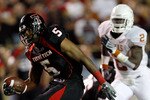 LUBBOCK, TX - NOVEMBER 01:  Michael Crabtree #5 of the Texas Tech Red Raiders carries the ball after making a reception during the first half of the game against the Texas Longhorns on November 1, 2008 at Jones Stadium in Lubbock, Texas.  (Photo by Jamie Squire/Getty Images)