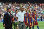 BARCELONA, SPAIN - AUGUST 25:  Former Barcelona president Joan Laparta (L) holds the 2009-2010 La Liga trophy with Barcelona manager Josep Guardiola during a lap of honour before the Joan Gamper Trophy match between Barcelona and AC Milan at Camp Nou stadium on August 25, 2010 in Barcelona, Spain.  (Photo by Denis Doyle/Getty Images)