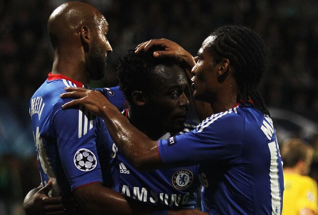 ZILINA, SLOVAKIA - SEPTEMBER 15:  Michael Essien of Chelsea (C) celebrates with Nicolas Anelka (L) and Florent Malouda (R) as he scores their first goal during the UEFA Champions League Group F match between MSK Zilina and Chelsea at the Pod Dubnom Stadium on September 15, 2010 in Zilina, Slovakia.  (Photo by Hamish Blair/Getty Images)