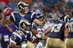ST. LOUIS - SEPTEMBER 2: Sam Bradford #8 of the St. Louis Rams passes against the Baltimore Ravens during an NFL preseason game at the Edward Jones Dome on September 2, 2010 in St. Louis, Missouri.  (Photo by Dilip Vishwanat/Getty Images)