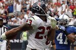 HOUSTON - SEPTEMBER 12:  Running back Arian Foster #23 of the Houston Texans runs for a touchdown in the NFL season opener against the Indianapolis Colts at Reliant Stadium on September 12, 2010 in Houston, Texas.  (Photo by Ronald Martinez/Getty Images)