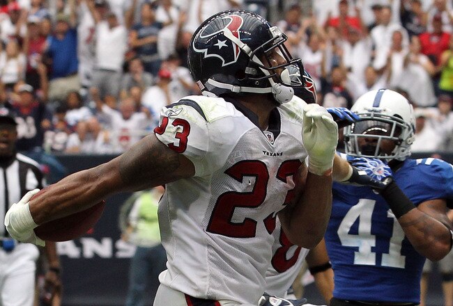 HOUSTON - SEPTEMBER 12:  Running back Arian Foster #23 of the Houston Texans runs for a touchdown in the NFL season opener against the Indianapolis Colts at Reliant Stadium on September 12, 2010 in Houston, Texas.  (Photo by Ronald Martinez/Getty Images)
