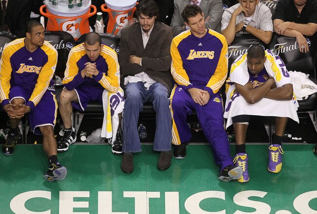 BOSTON - JUNE 10:  (L-R) Shannon Brown, Jordan Farmar, Adam Morrison, Luke Walton and Andrew Bynum of the Los Angeles Lakers look on dejected from the bench late in the fourth quarter against the Boston Celltics during Game Four of the 2010 NBA Finals on June 10, 2010 at TD Garden in Boston, Massachusetts. NOTE TO USER: User expressly acknowledges and agrees that, by downloading and/or using this Photograph, user is consenting to the terms and conditions of the Getty Images License Agreement.  (Photo by Jim Rogash/Getty Images)
