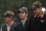 LEMONT, IL - SEPTEMBER 11:  (L-R) Luke Donald, Paul Casey and Ian Poulter of England walk off the fifth tee during the third round of the BMW Championship at Cog Hill Golf & Country Club on September 11, 2010 in Lemont, Illinois.  (Photo by Scott Halleran/Getty Images)