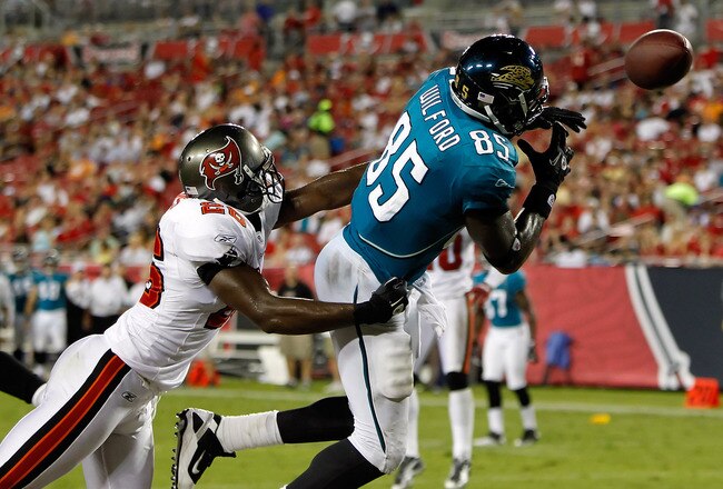 TAMPA, FL - AUGUST 28:  Tight end Ernest Wilford #85 of the Jacksonville Jaguars cannot bring in this pass as safety Sean Jones #26 of the Tampa Bay Buccaneers tries to break it up during a preseason game at Raymond James Stadium on August 28, 2010 in Tampa, Florida.  (Photo by J. Meric/Getty Images)
