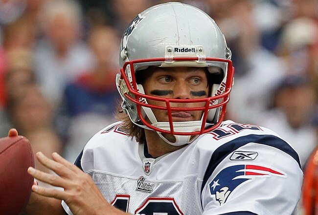 FOXBORO, MA - SEPTEMBER 12: Quarterbacks Tom Brady #12 of the New England Patriots throws a pass during a the NFL season opener against the Cincinnati Bengals at Gillette Stadium on September 12, 2010 in Foxboro, Massachusetts. (Photo by Jim Rogash/Getty Images)