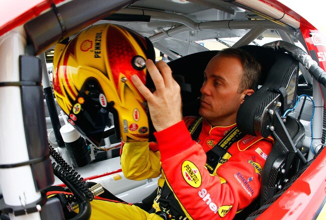 LOUDON, NH - SEPTEMBER 17:  Kevin Harvick, driver of the #29 Shell / Pennzoil Chevrolet, adjusts his helmet in the car during practice for the NASCAR Sprint Cup Series Sylvania 300 at New Hampshire Motor Speedway on September 17, 2010 in Loudon, New Hampshire.  (Photo by Jason Smith/Getty Images for NASCAR)