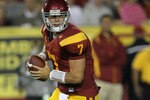 LOS ANGELES, CA - SEPTEMBER 11:  Quarterback Matt Barkley #7 of the USC Trojans rolls out against the Virginia Cavaliers at Los Angeles Memorial Coliseum on September 11, 2010 in Los Angeles, California. USC won 17-14.  (Photo by Stephen Dunn/Getty Images)