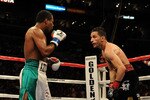 LOS ANGELES, CA - SEPTEMBER 18: (Left)  Shane Mosley and Sergio Mora fight to a draw during the sixth round of the Middleweight bout at Staples Center on September 18, 2010 in Los Angeles, California.  (Photo by Harry How/Getty Images)
