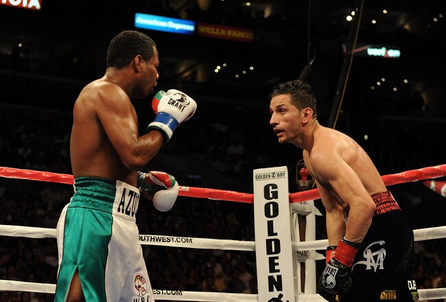 LOS ANGELES, CA - SEPTEMBER 18: (Left)  Shane Mosley and Sergio Mora fight to a draw during the sixth round of the Middleweight bout at Staples Center on September 18, 2010 in Los Angeles, California.  (Photo by Harry How/Getty Images)