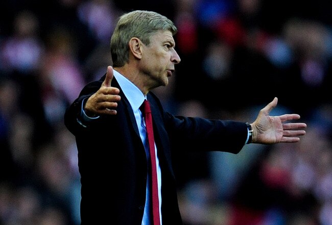 SUNDERLAND, ENGLAND - SEPTEMBER 18:  Arsenal Manager Arsene Wenger reacts during the Barclays Premier League match between Sunderland and Arsenal at the Stadium of Light on September 18, 2010 in Sunderland, England.  (Photo by Jamie McDonald/Getty Images)