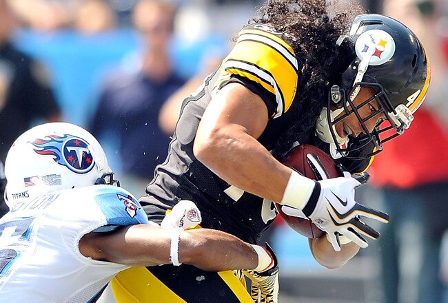 NASHVILLE, TN - SEPTEMBER 19:  Troy Polamalu #43 of the Pittsburgh Steelers intercepts a pass in the end zone intended for Nate Washington #85 of the Tennessee Titans  during the first half at LP Field on September 19, 2010 in Nashville, Tennessee.  (Photo by Grant Halverson/Getty Images)