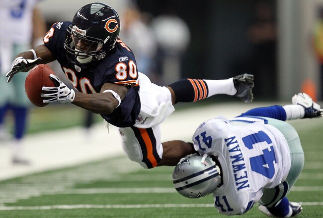 ARLINGTON, TX - SEPTEMBER 19:  Wide receiver Earl Bennett #80 of the Chicago Bears dives for extra yardage while tackled by Terence Newman #41 of the Dallas Cowboys at Cowboys Stadium on September 19, 2010 in Arlington, Texas.  (Photo by Ronald Martinez/Getty Images)
