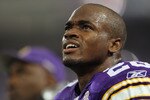 MINNEAPOLIS - SEPTEMBER 19:  Adrian Peterson #28 of the Minnesota Vikings watches a replay on the scoreboard during the game against the Miami Dolphins on September 19, 2010 at Hubert H. Humphrey Metrodome in Minneapolis, Minnesota.  (Photo by Jamie Squire/Getty Images)