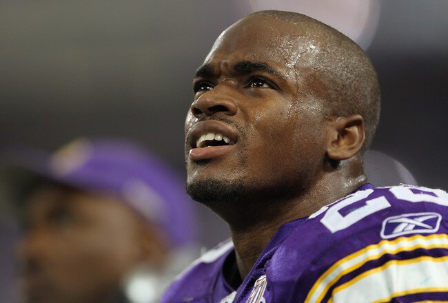 MINNEAPOLIS - SEPTEMBER 19:  Adrian Peterson #28 of the Minnesota Vikings watches a replay on the scoreboard during the game against the Miami Dolphins on September 19, 2010 at Hubert H. Humphrey Metrodome in Minneapolis, Minnesota.  (Photo by Jamie Squire/Getty Images)