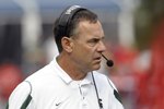 ORLANDO, FL - JANUARY 1: Coach Mark Dantonio of the Michigan State Spartans directs play against the Georgia Bulldogs at the 2009 Capital One Bowl at the Citrus Bowl on January 1, 2009 in Orlando, Florida.  (Photo by Al Messerschmidt/Getty Images)