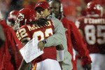 KANSAS CITY, MO - SEPTEMBER 13:  Dexter McCluster #22 of the Kansas City Chiefs is congratulated by head coach Todd Haley after returning a punt for a touchdown during the 1st half of the game against on September 13, 2010 at Arrowhead Stadium in Kansas City, Missouri.  (Photo by Jamie Squire/Getty Images)