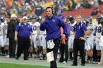 TAMPA, FL - JANUARY 1: Coach Pat Fitzgerald of the Northwestern Wildcats directs play against the Auburn Tigers in the Outback Bowl January 1, 2010 at Raymond James Stadium in Tampa, Florida.  (Photo by Al Messerschmidt/Getty Images)