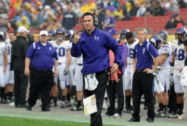 TAMPA, FL - JANUARY 1: Coach Pat Fitzgerald of the Northwestern Wildcats directs play against the Auburn Tigers in the Outback Bowl January 1, 2010 at Raymond James Stadium in Tampa, Florida.  (Photo by Al Messerschmidt/Getty Images)