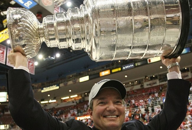 DETROIT - JUNE 12:  General Manager Ray Shero of the Pittsburgh Penguins holds the Stanley Cup following the Penguins victory over the Detroit Red Wings in Game Seven of the 2009 NHL Stanley Cup Finals at Joe Louis Arena on June 12, 2009 in Detroit, Michigan.  (Photo by Bruce Bennett/Getty Images)