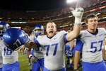 LANDOVER, MD - SEPTEMBER 06:  Guard Spencer Gerke #77 of the Boise State Broncos celebrates after the Broncos defeated the Virginia Tech Hokies 33-30  at FedExField on September 6, 2010 in Landover, Maryland.  (Photo by Geoff Burke/Getty Images)