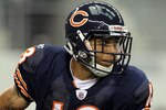 ARLINGTON, TX - SEPTEMBER 19:  Wide receiver Johnny Knox #13 of the Chicago Bears runs the ball against the Dallas Cowboys at Cowboys Stadium on September 19, 2010 in Arlington, Texas.  (Photo by Ronald Martinez/Getty Images)