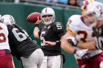 OAKLAND, CA - DECEMBER 13:  Bruce Gradkowski #5 of the Oakland Raiders passes the ball during their game against the Washington Redskins at Oakland-Alameda County Coliseum on December 13, 2009 in Oakland, California.  (Photo by Ezra Shaw/Getty Images)