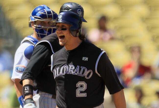 LOS ANGELES, CA - SEPTEMBER 18:  Troy Tulowitzki #2 of the Colorado Rockies celebrates as he crosses home plate after hitting a two-run home run against the Los Angeles Dodgers in the first inning at Dodger Stadium on September 18, 2010 in Los Angeles, California. The Rockies defeated the Dodgers 12-2. (Photo by Jeff Gross/Getty Images)
