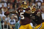 LANDOVER - SEPTEMBER 12:  Donovan McNabb #5 of the Washington Redskins passes during the NFL season opener against the Dallas Cowboys at FedExField on September 12, 2010 in Landover, Maryland. The Redskins defeated the Cowboys 13-7. (Photo by Larry French/Getty Images)