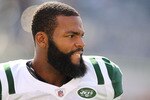 EAST RUTHERFORD, NJ - SEPTEMBER 19:  Braylon Edwards #17 of the New York Jets looks on during warmups prior to the game against the New England Patriots on September 19, 2010 at the New Meadowlands Stadium  in East Rutherford, New Jersey.  (Photo by Al Bello/Getty Images)