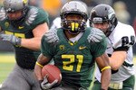 EUGENE, OR - SEPTEMBER 18: Running back LaMichael James #21of the Oregon Ducks heads to the end zone for a touchdown as defensive end Jack Forbes #99 of the Portland State Vikings gives chase in the second quarter of the game at Autzen Stadium on September 18, 2010 in Eugene, Oregon. Oregon won the game 69-0. (Photo by Steve Dykes/Getty Images)