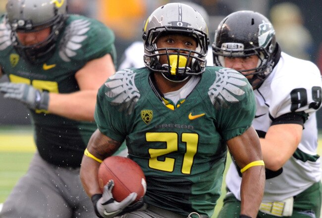 EUGENE, OR - SEPTEMBER 18: Running back LaMichael James #21of the Oregon Ducks heads to the end zone for a touchdown as defensive end Jack Forbes #99 of the Portland State Vikings gives chase in the second quarter of the game at Autzen Stadium on September 18, 2010 in Eugene, Oregon. Oregon won the game 69-0. (Photo by Steve Dykes/Getty Images)