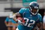JACKSONVILLE, FL - SEPTEMBER 12:  Maurice Jones-Drew #32 of the Jacksonville Jaguars runs for yardage during the NFL season opener game against the Denver Broncos at EverBank Field on September 12, 2010 in Jacksonville, Florida.  (Photo by Sam Greenwood/Getty Images)
